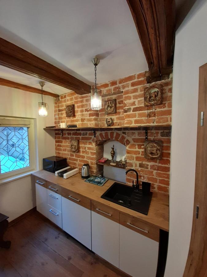 Apartament Witrazysty A.D. 1555 ทอรูน ภายนอก รูปภาพ